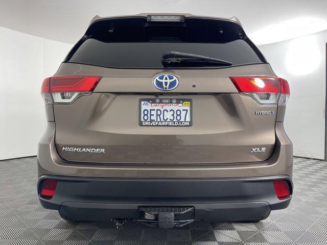 used 2018 Toyota Highlander Hybrid car, priced at $34,435