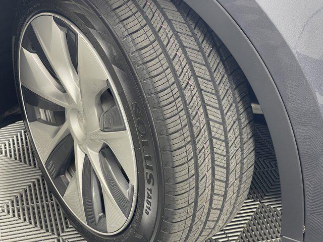 used 2021 Tesla Model Y car, priced at $30,900