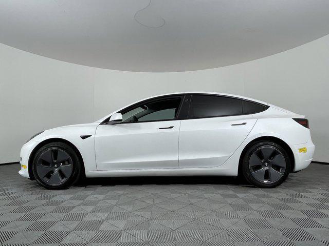 used 2022 Tesla Model 3 car, priced at $27,694