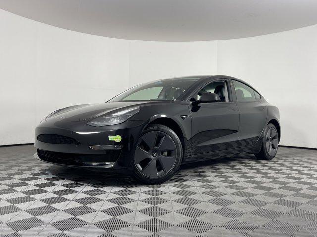 used 2023 Tesla Model 3 car, priced at $30,357