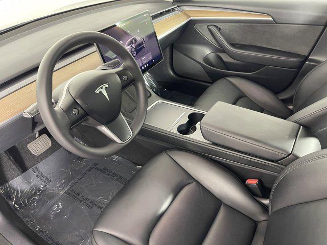 used 2023 Tesla Model 3 car, priced at $30,357