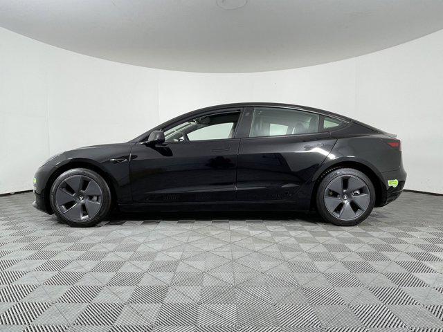 used 2023 Tesla Model 3 car, priced at $30,357
