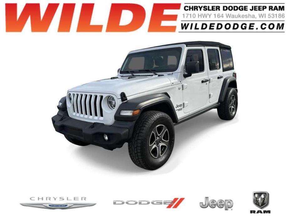 used 2021 Jeep Wrangler Unlimited car, priced at $31,545