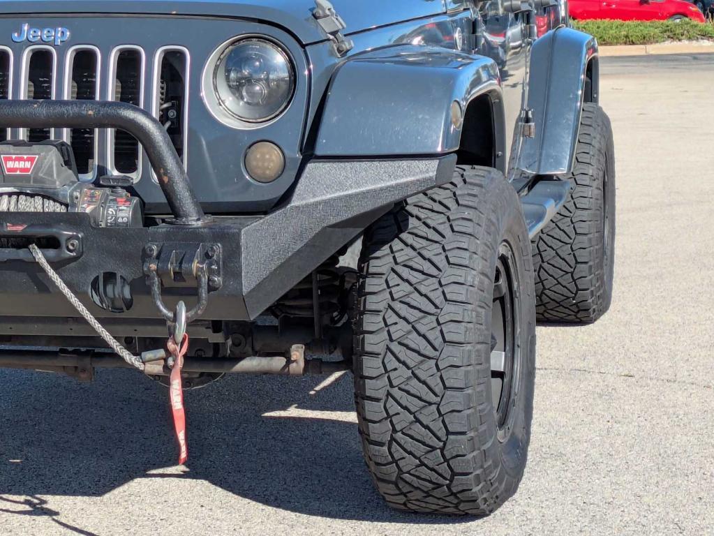 used 2016 Jeep Wrangler Unlimited car, priced at $19,276