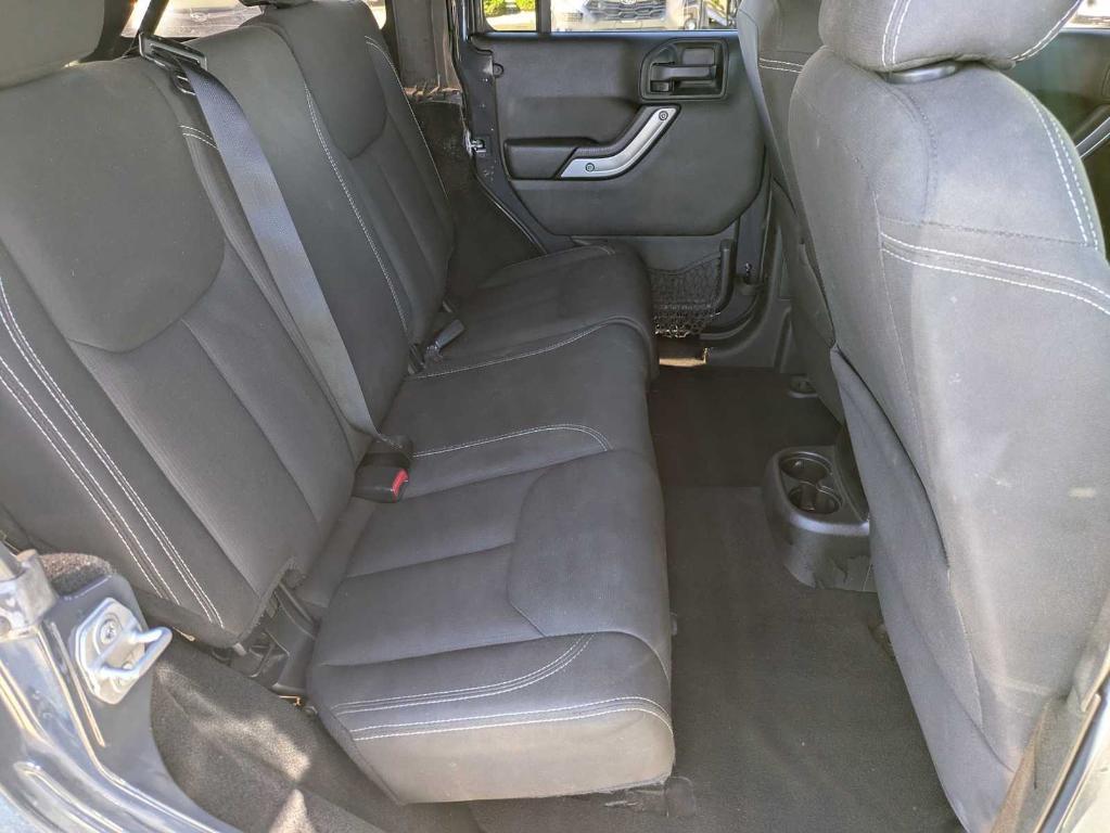used 2016 Jeep Wrangler Unlimited car, priced at $19,276