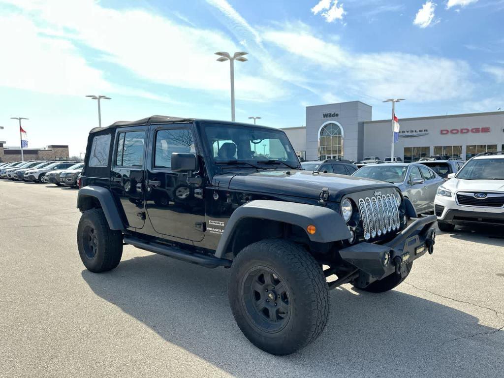 used 2016 Jeep Wrangler Unlimited car, priced at $19,249