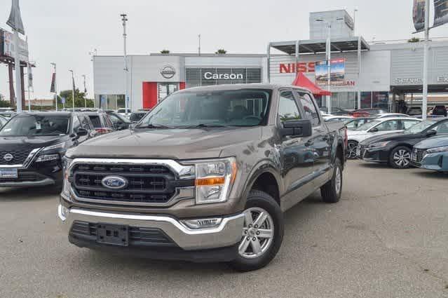 used 2021 Ford F-150 car, priced at $33,477