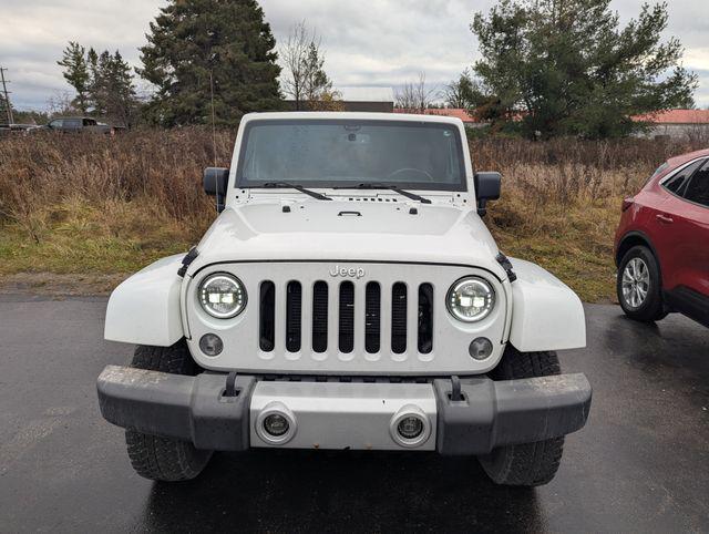 used 2014 Jeep Wrangler Unlimited car, priced at $19,322