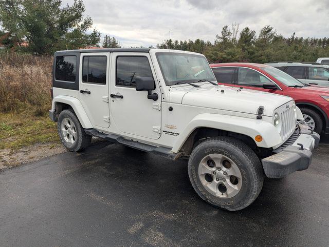 used 2014 Jeep Wrangler Unlimited car, priced at $19,322