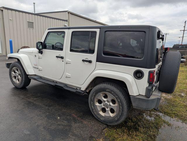 used 2014 Jeep Wrangler Unlimited car, priced at $19,322