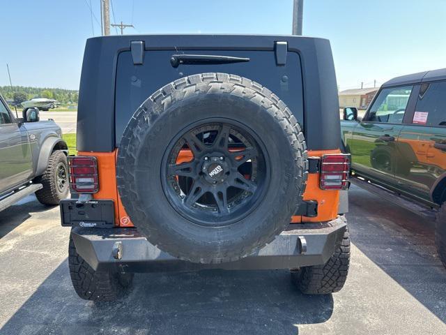 used 2013 Jeep Wrangler Unlimited car, priced at $16,450