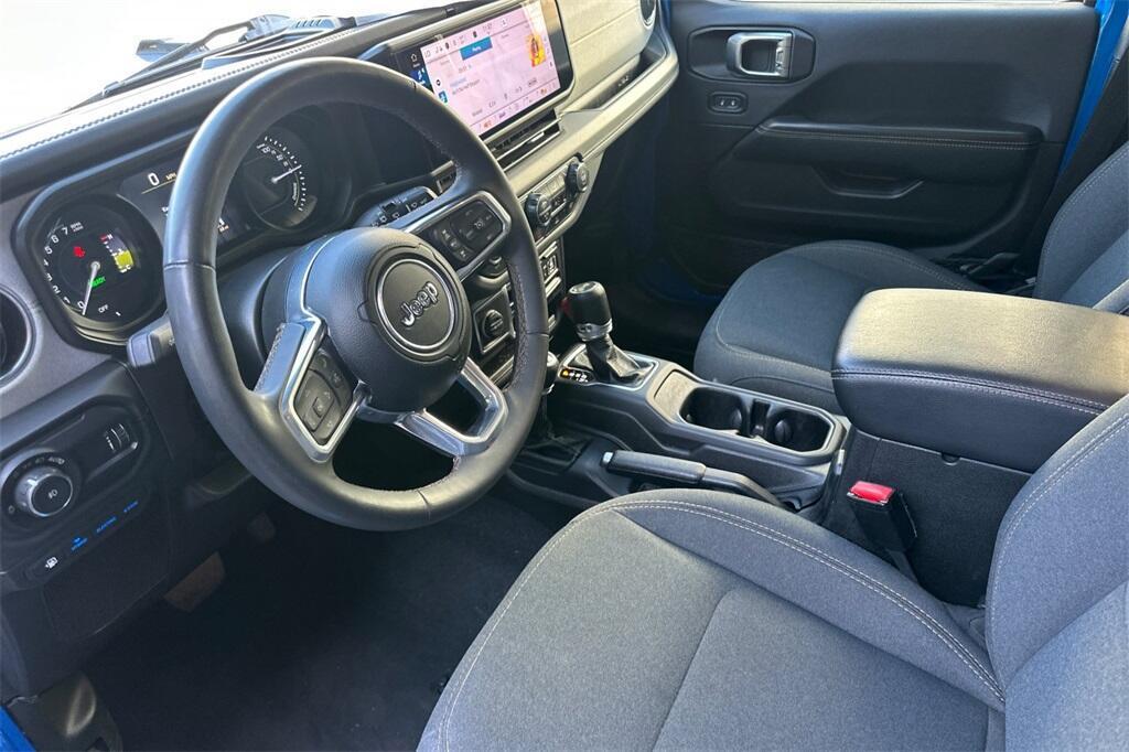 used 2024 Jeep Wrangler 4xe car, priced at $37,651