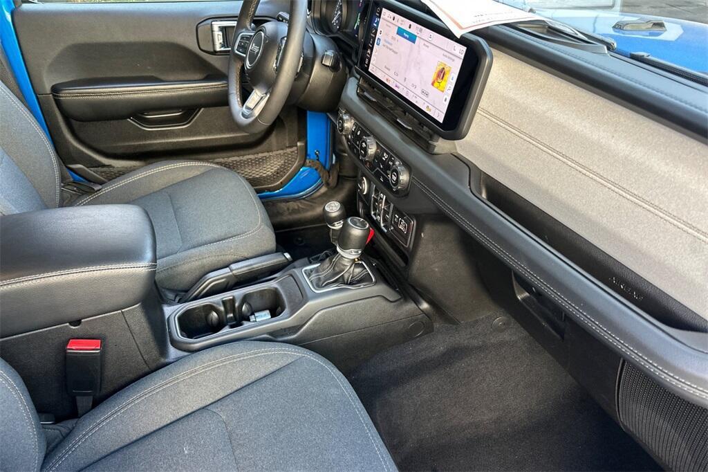 used 2024 Jeep Wrangler 4xe car, priced at $37,651
