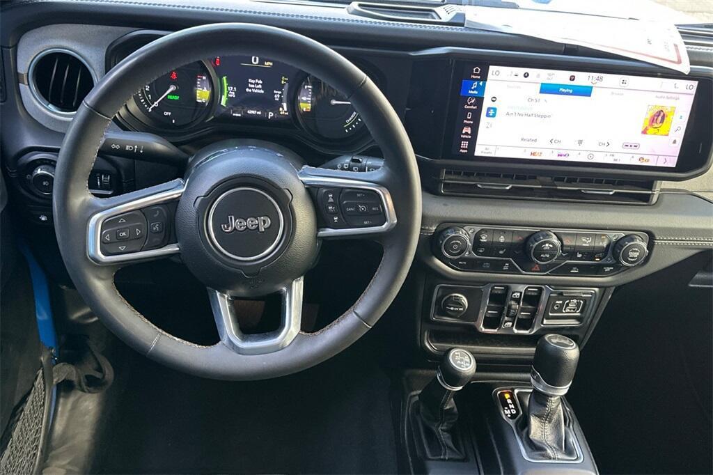 used 2024 Jeep Wrangler 4xe car, priced at $37,651