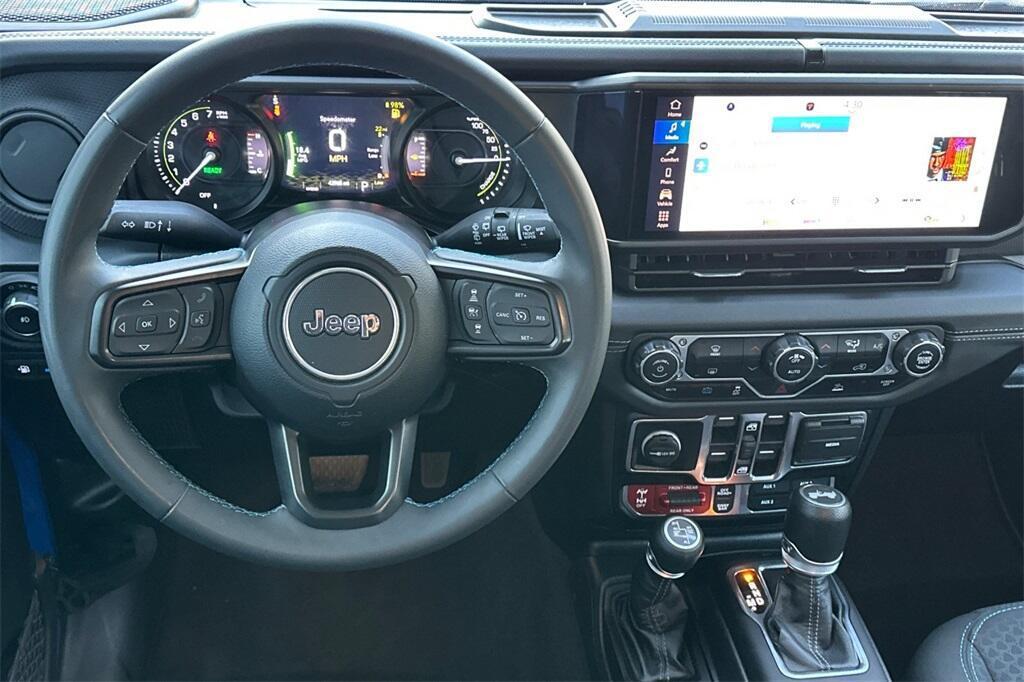 used 2024 Jeep Wrangler 4xe car, priced at $37,957