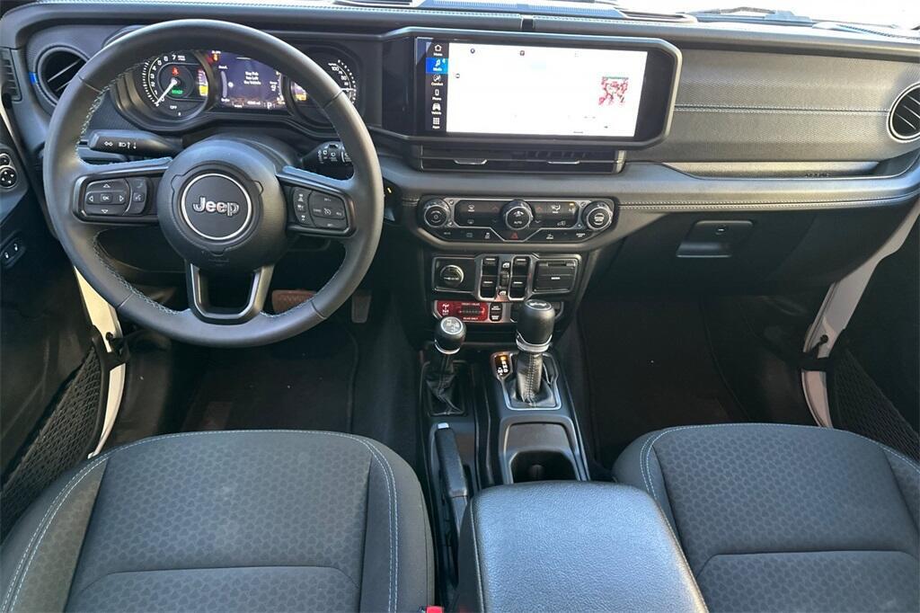 used 2024 Jeep Wrangler 4xe car, priced at $35,853