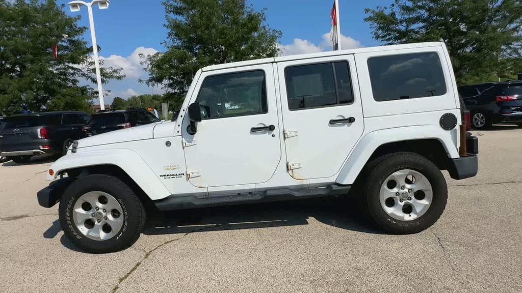 used 2013 Jeep Wrangler Unlimited car, priced at $13,938