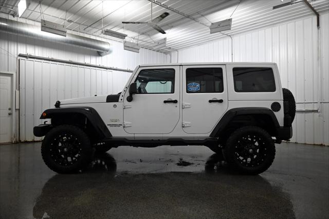 used 2015 Jeep Wrangler Unlimited car, priced at $16,900