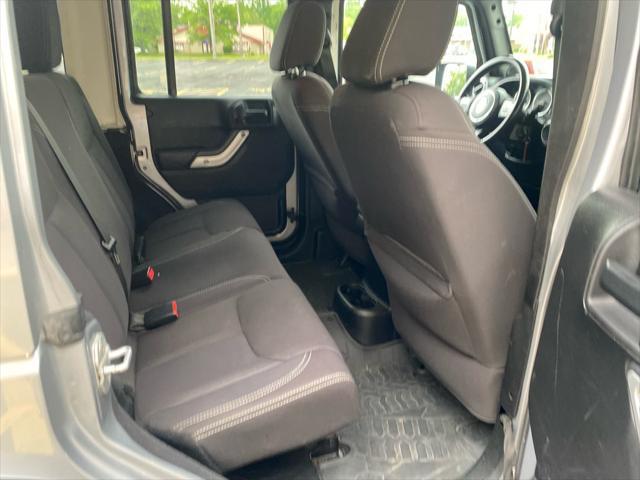 used 2013 Jeep Wrangler Unlimited car, priced at $13,995
