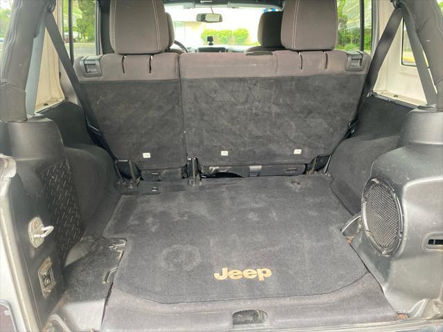 used 2013 Jeep Wrangler Unlimited car, priced at $13,995