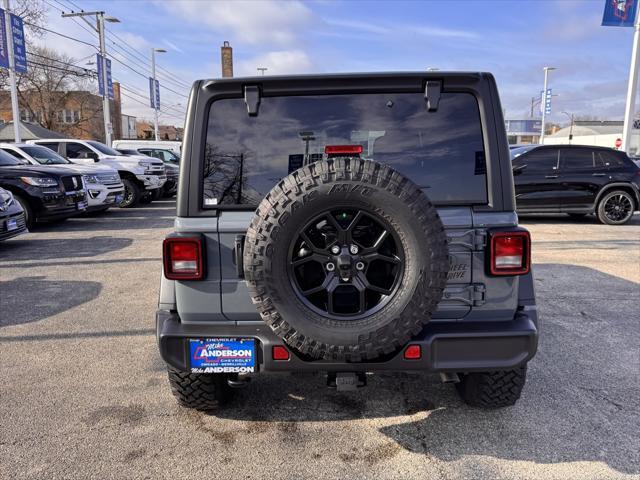 used 2024 Jeep Wrangler car, priced at $48,999