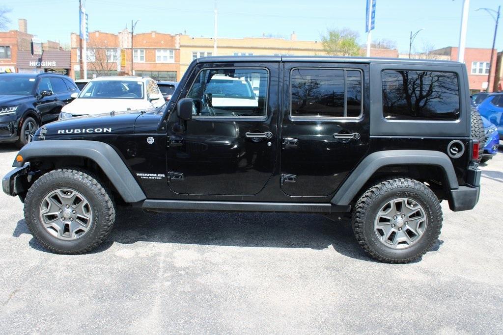 used 2015 Jeep Wrangler Unlimited car, priced at $21,352