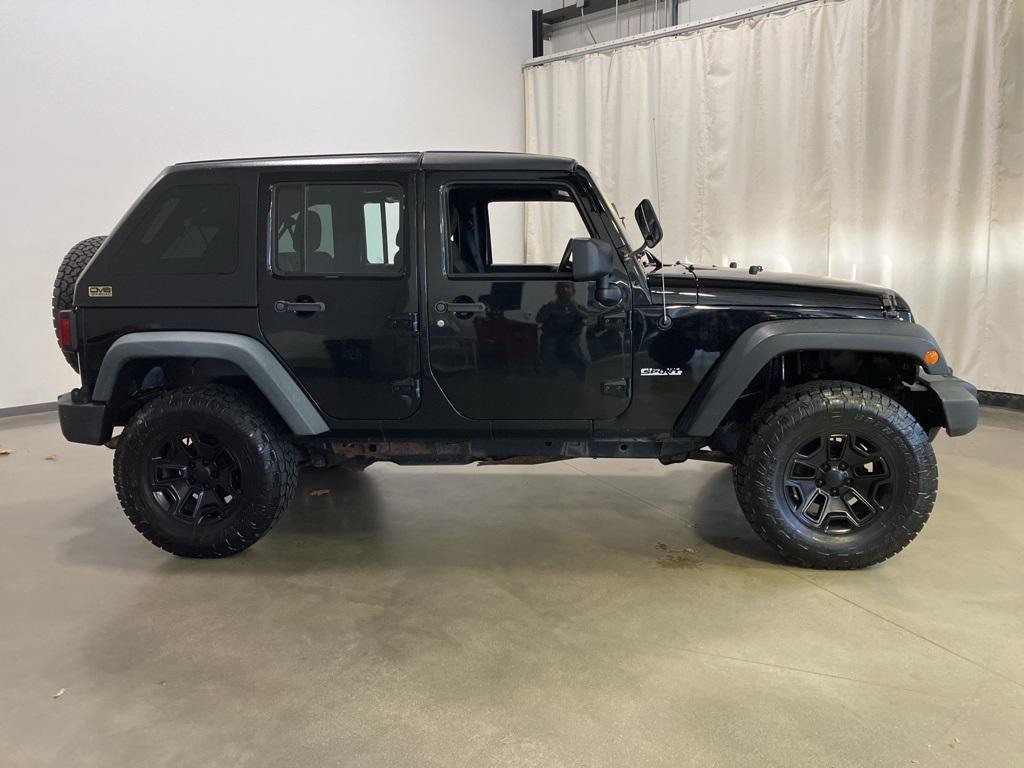 used 2011 Jeep Wrangler Unlimited car, priced at $10,000