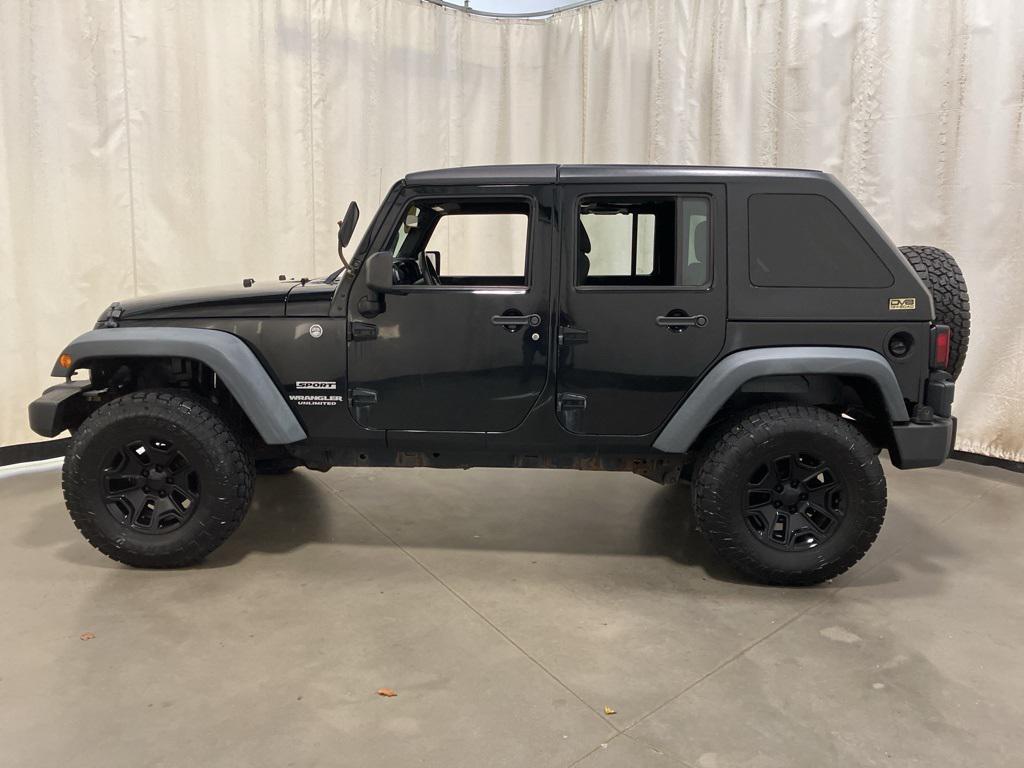 used 2011 Jeep Wrangler Unlimited car, priced at $10,000
