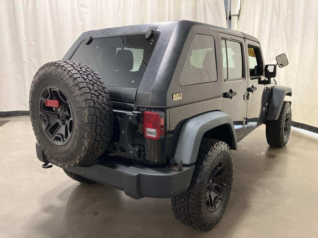 used 2011 Jeep Wrangler Unlimited car, priced at $10,000