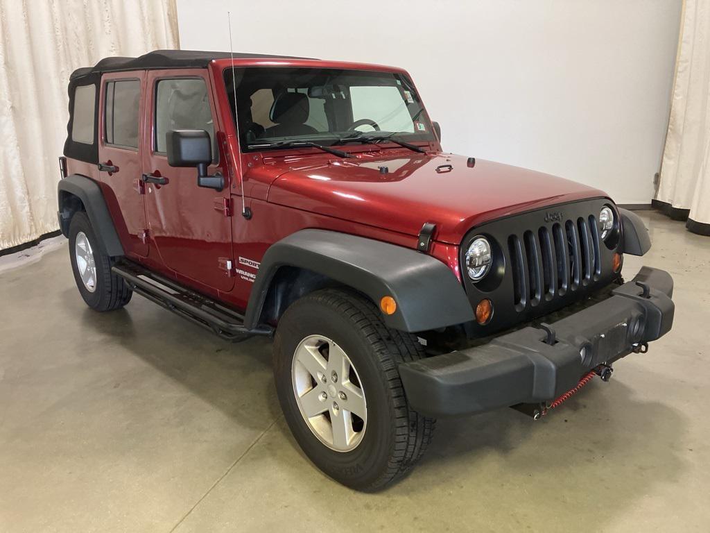 used 2013 Jeep Wrangler Unlimited car, priced at $13,999