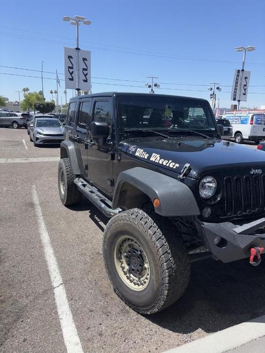 used 2016 Jeep Wrangler Unlimited car, priced at $23,555
