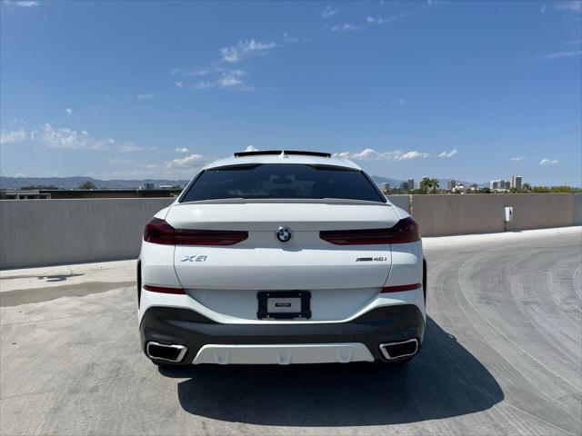 used 2021 BMW X6 car, priced at $54,977