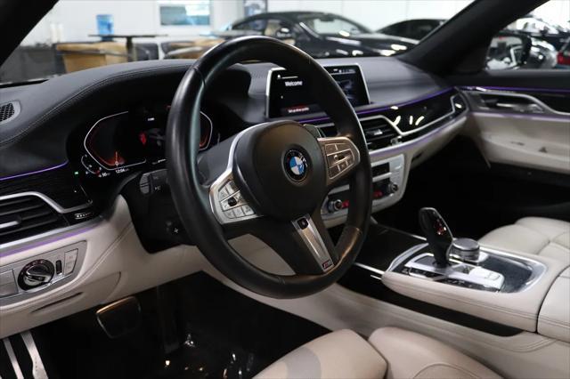 used 2022 BMW 750 car, priced at $49,990