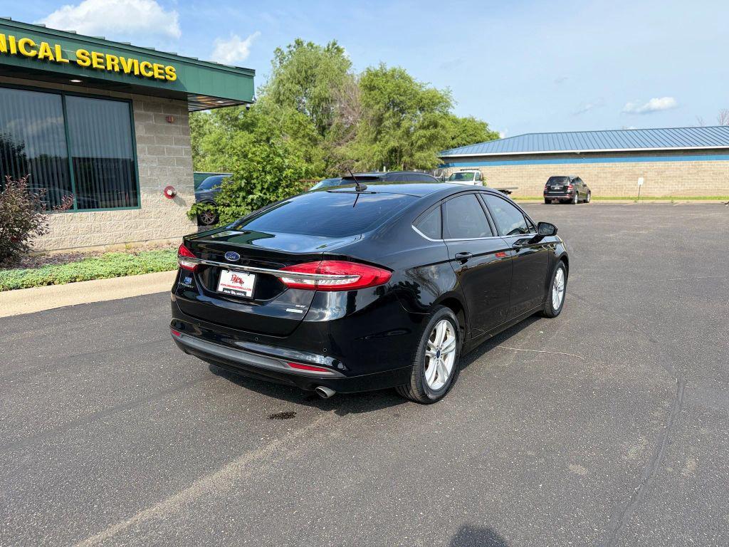 used 2018 Ford Fusion car, priced at $12,497