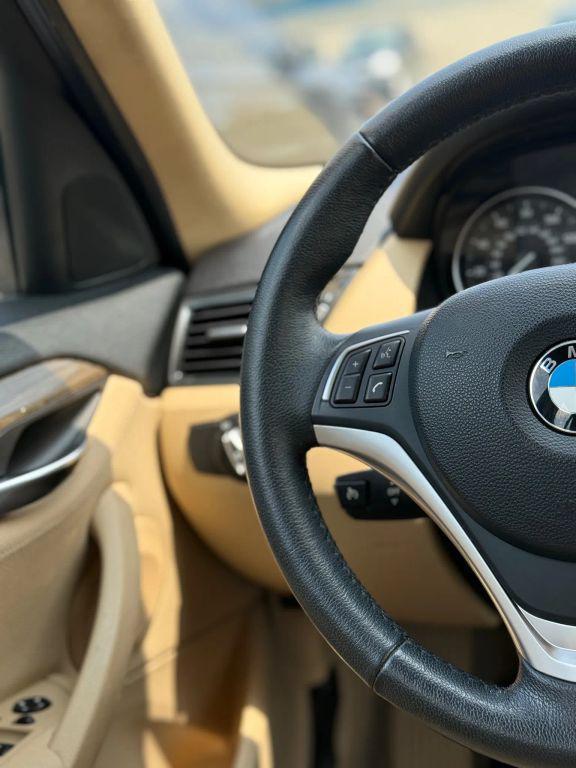 used 2014 BMW X1 car, priced at $11,997