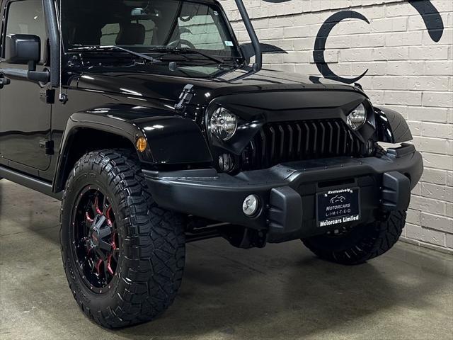 used 2016 Jeep Wrangler Unlimited car, priced at $24,293