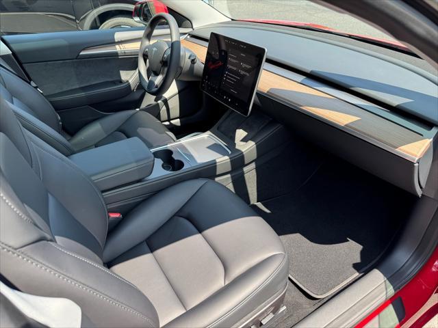 used 2023 Tesla Model 3 car, priced at $28,950