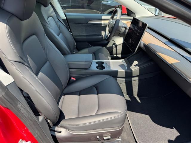 used 2023 Tesla Model 3 car, priced at $28,950