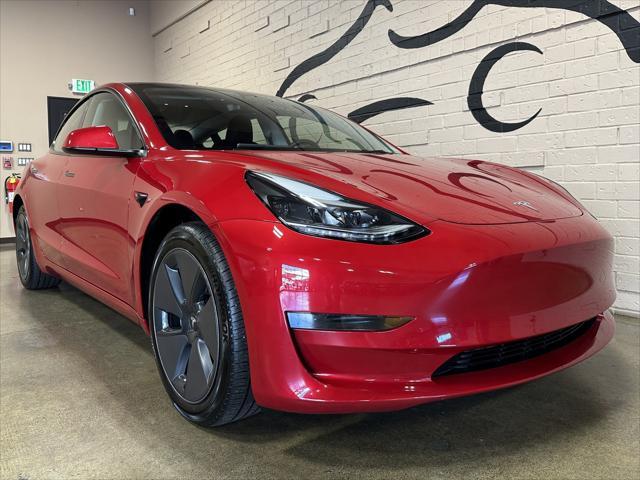 used 2023 Tesla Model 3 car, priced at $29,205