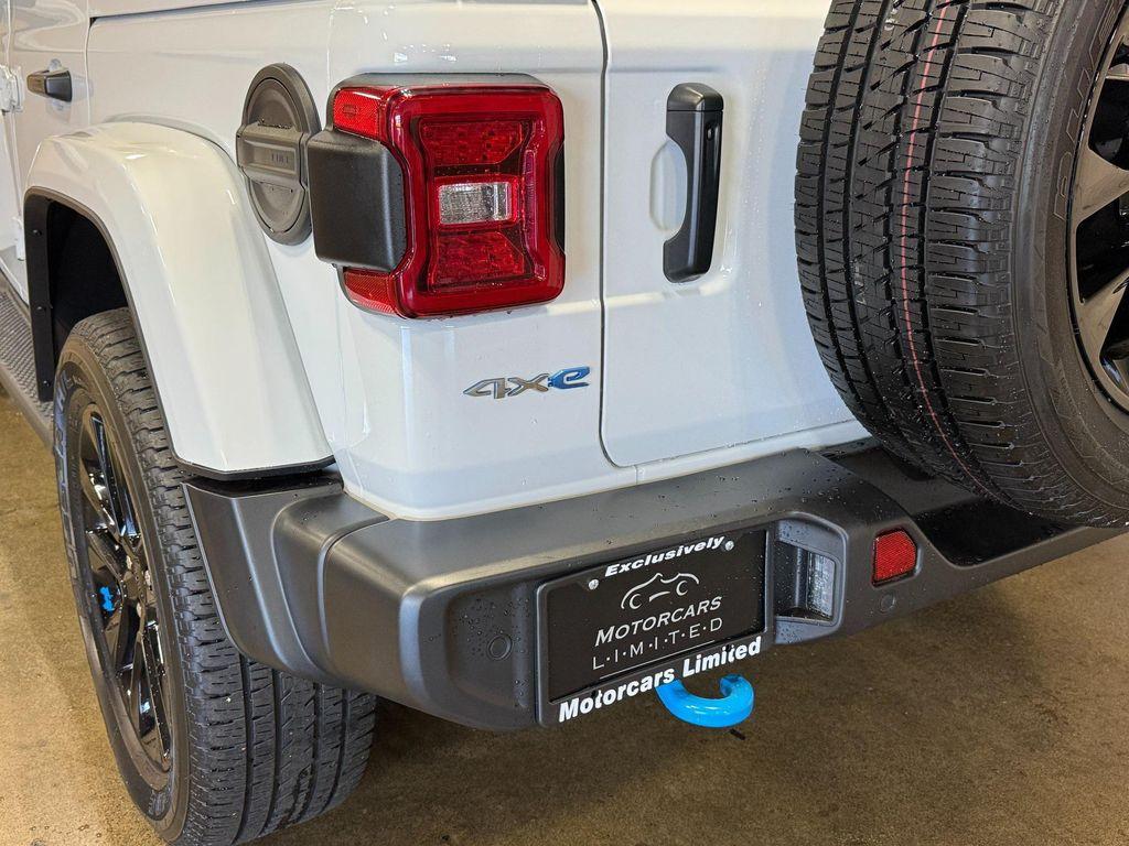 used 2023 Jeep Wrangler 4xe car, priced at $33,978