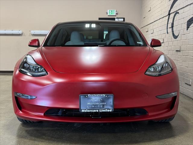 used 2023 Tesla Model 3 car, priced at $42,950