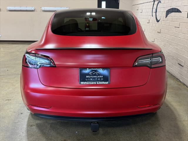 used 2023 Tesla Model 3 car, priced at $42,950