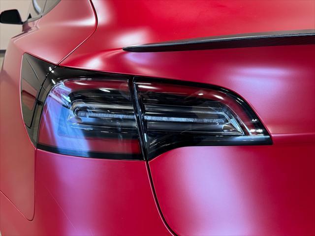 used 2023 Tesla Model 3 car, priced at $42,950