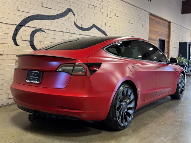 used 2023 Tesla Model 3 car, priced at $42,950