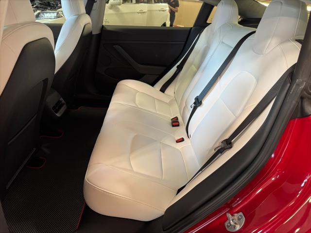 used 2023 Tesla Model 3 car, priced at $42,950