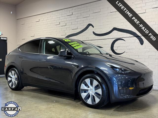 used 2024 Tesla Model Y car, priced at $42,950