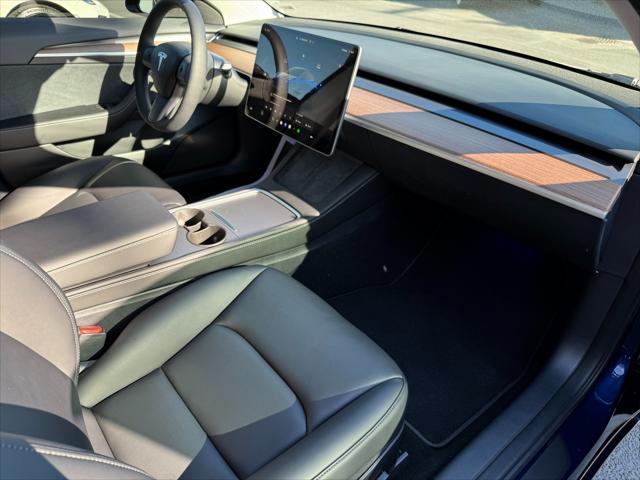 used 2023 Tesla Model 3 car, priced at $38,950