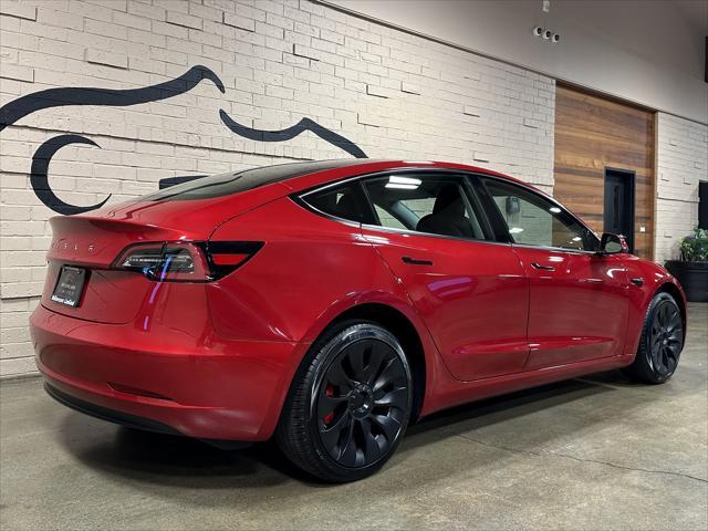 used 2023 Tesla Model 3 car, priced at $27,786