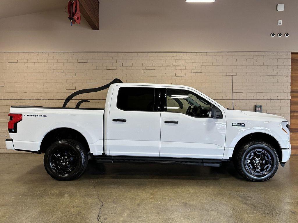 used 2025 Ford F-150 Lightning car, priced at $49,950