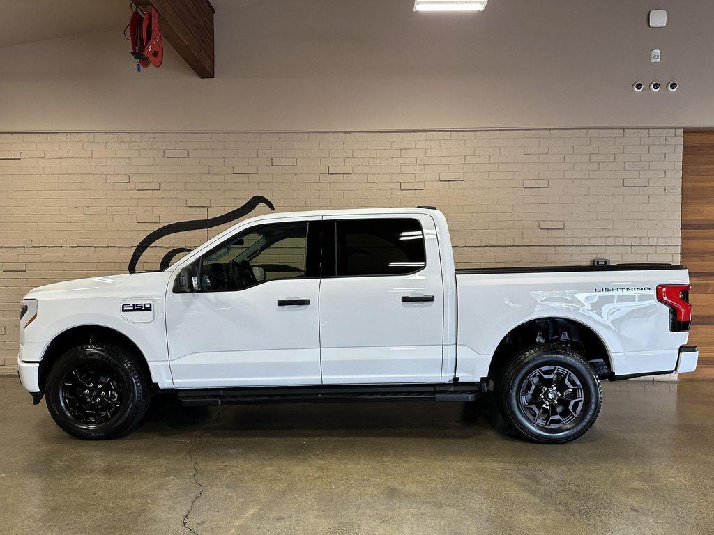 used 2025 Ford F-150 Lightning car, priced at $49,950